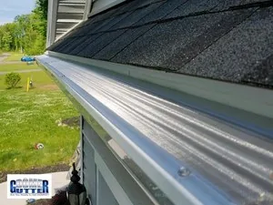 Seamless gutter straight run with GutterDome guard